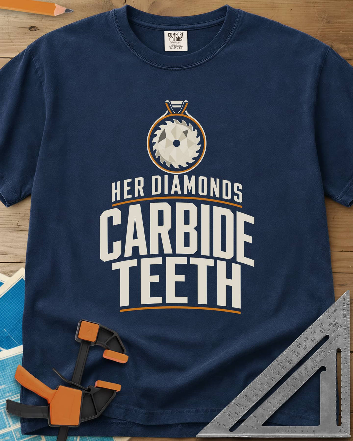 Carbide Teeth heavyweight tee in Navy, a saw blade cut like a gemstone hanging as a pendant