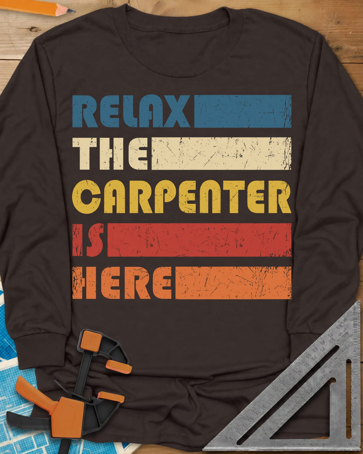 Carpenter is Here long sleeve shirt in Dark Chocolate, retro stacked lettering with solid color bars in five colors