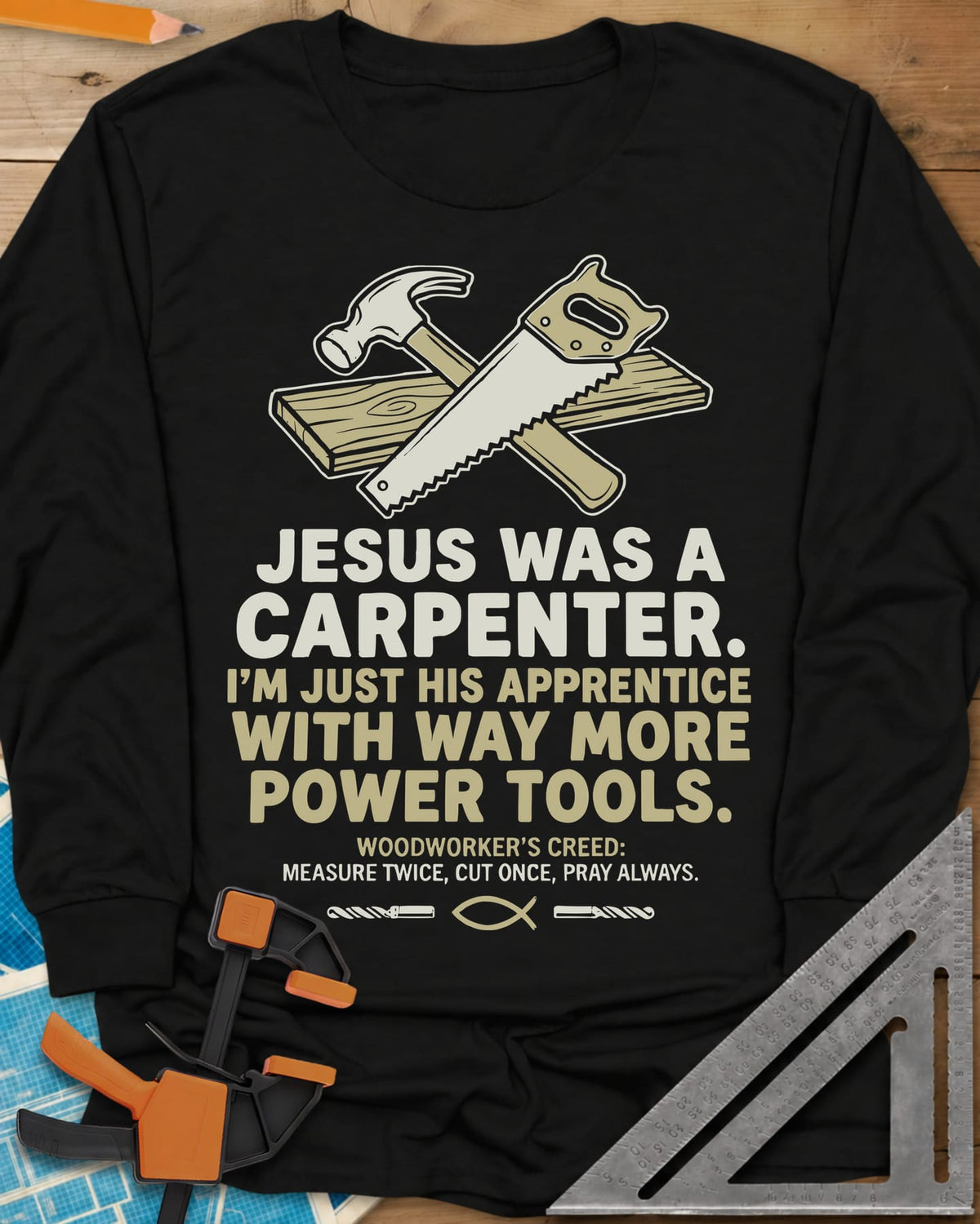 Carpenter's Creed long sleeve shirt in Black, a hammer and handsaw crossed over a plank, with a small fish symbol