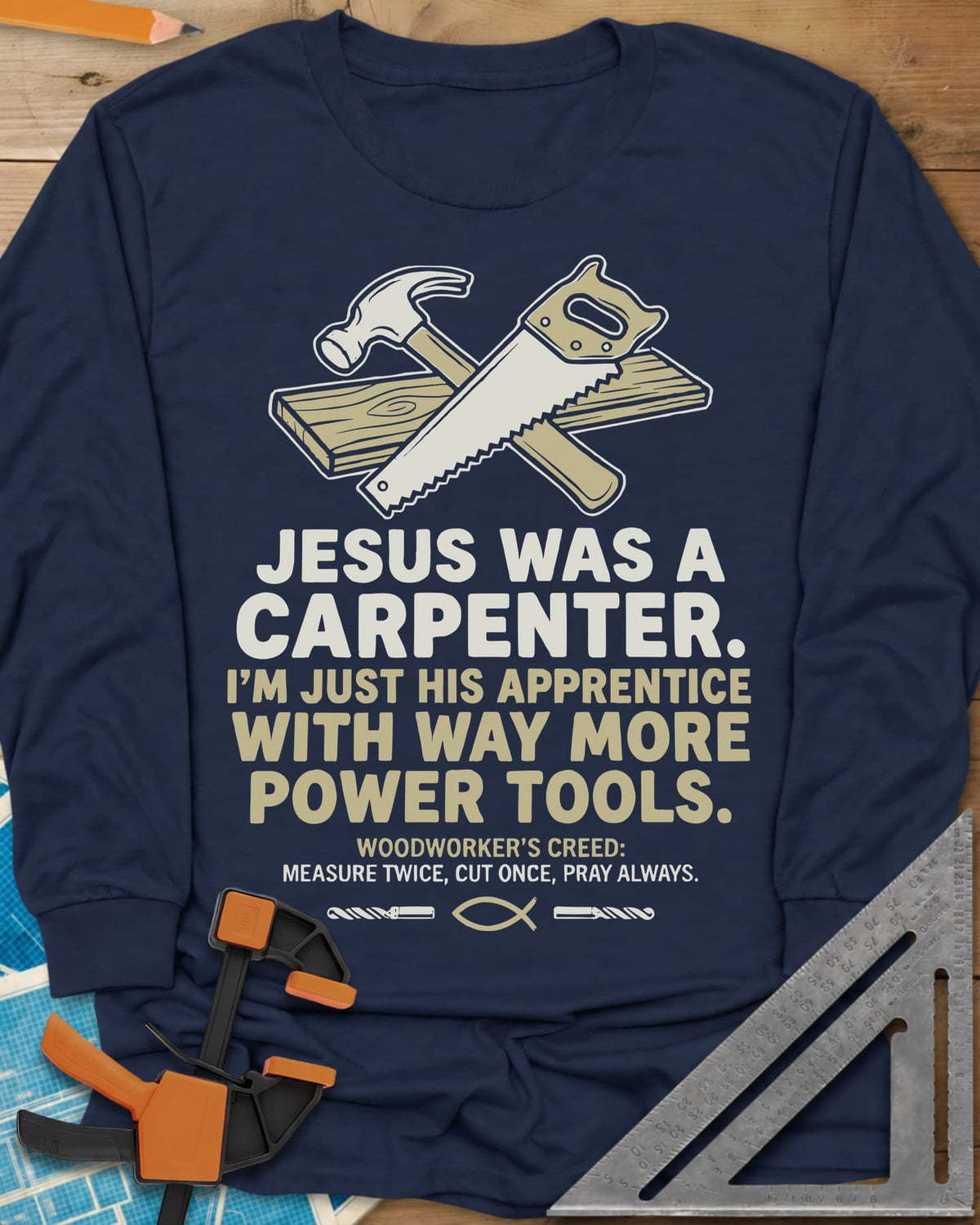 Carpenter's Creed long sleeve shirt in Navy, a hammer and handsaw crossed over a plank, with a small fish symbol