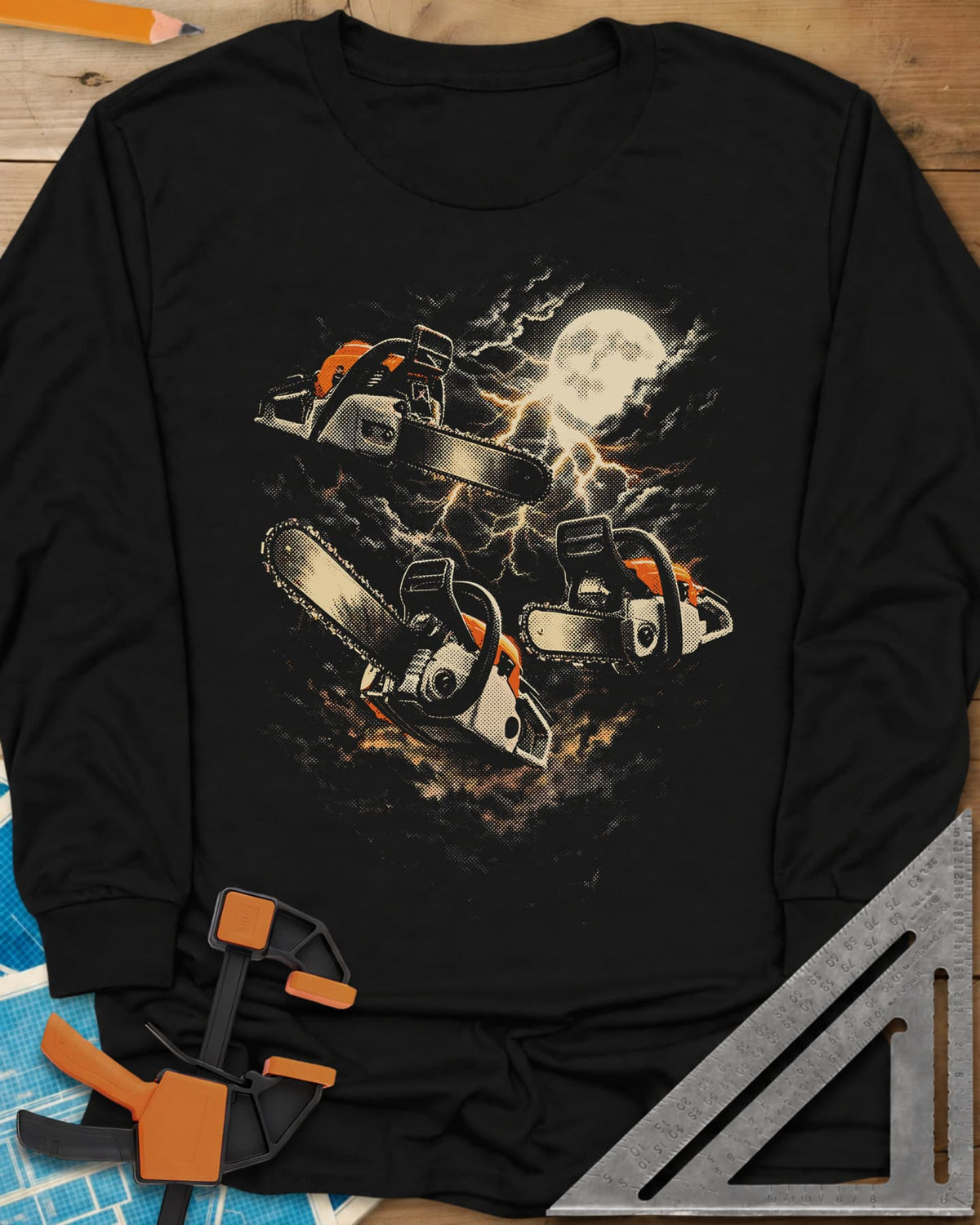 Chainsaw After Dark long sleeve shirt in Black, three chainsaws floating under a full moon and lightning
