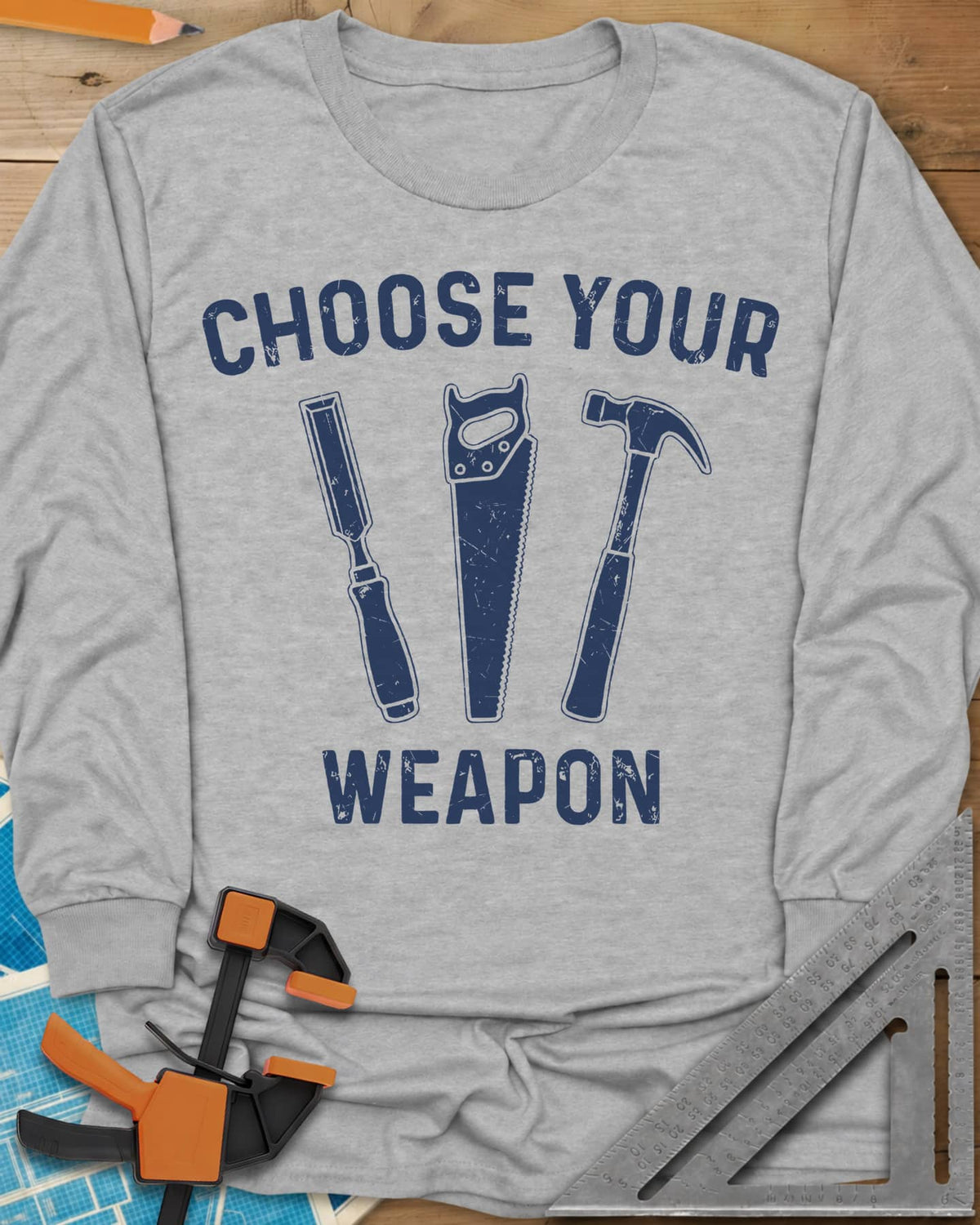 Choose Your Weapon long sleeve shirt in Sport Grey, a chisel, a handsaw and a claw hammer standing in a row