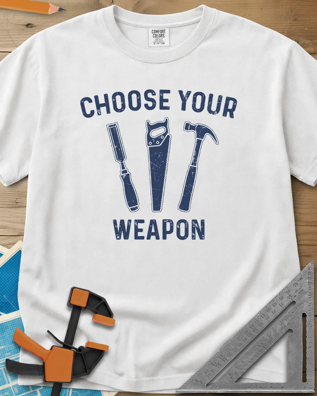 Choose Your Weapon heavyweight tee in White, a chisel, a handsaw and a claw hammer standing in a row