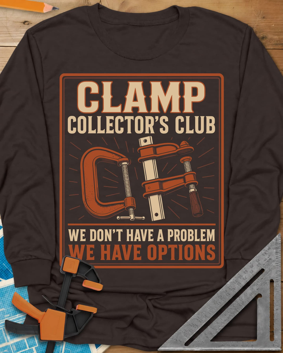 Clamp Collectors Options long sleeve shirt in Dark Chocolate, framed club badge with a rust C-clamp and a bar clamp