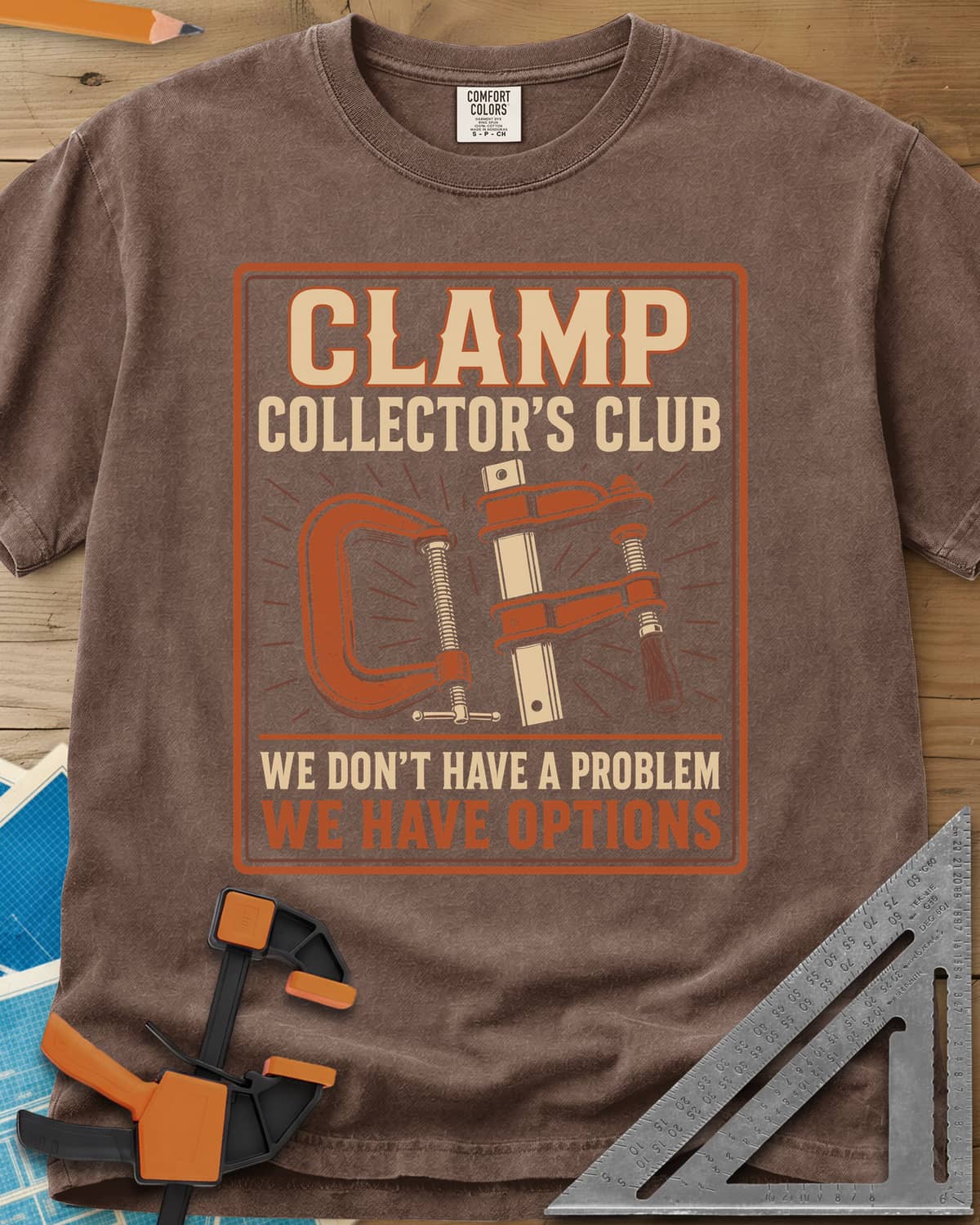 Clamp Collectors Options heavyweight tee in Espresso, framed club badge with a rust C-clamp and a bar clamp