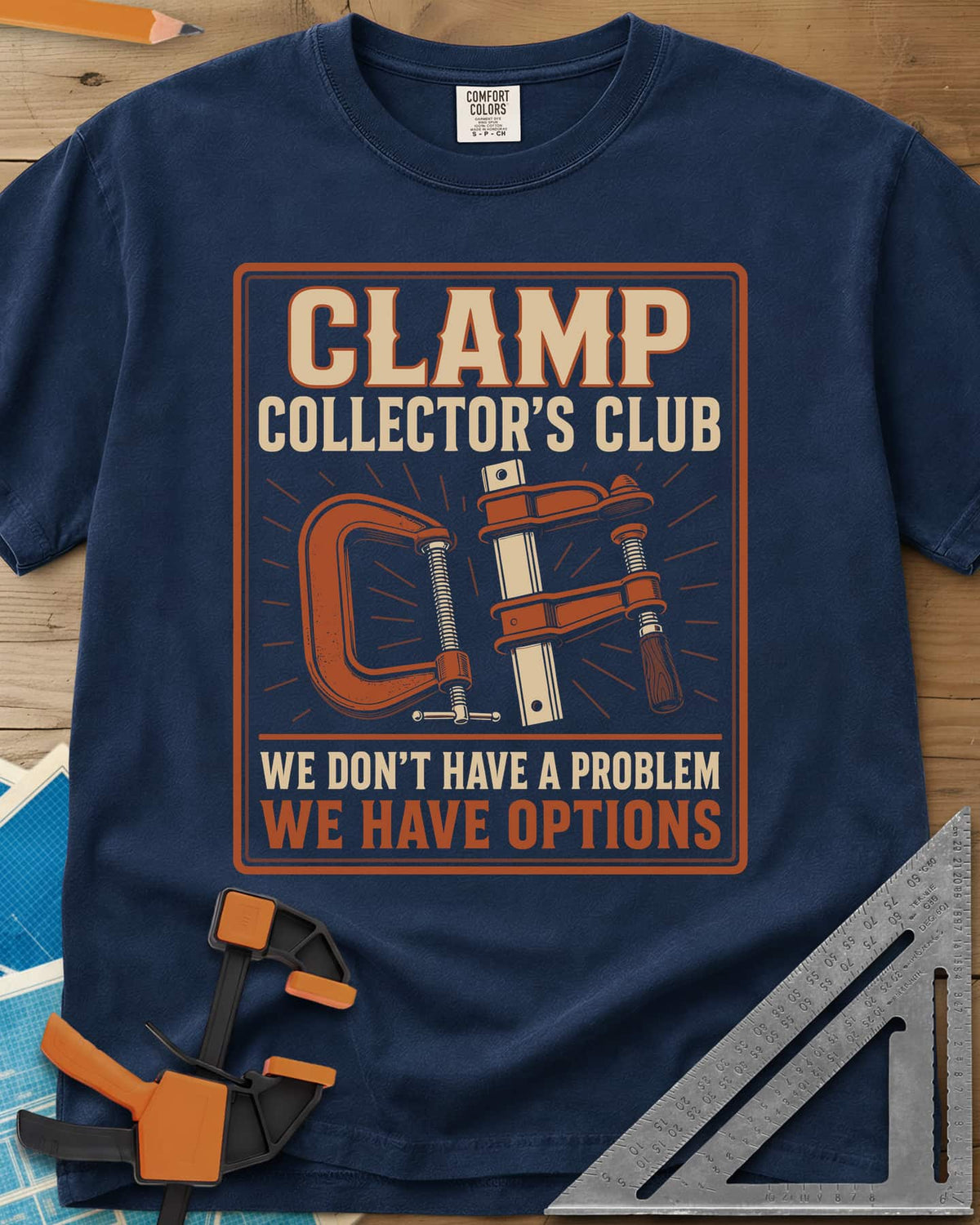 Clamp Collectors Options heavyweight tee in Navy, framed club badge with a rust C-clamp and a bar clamp