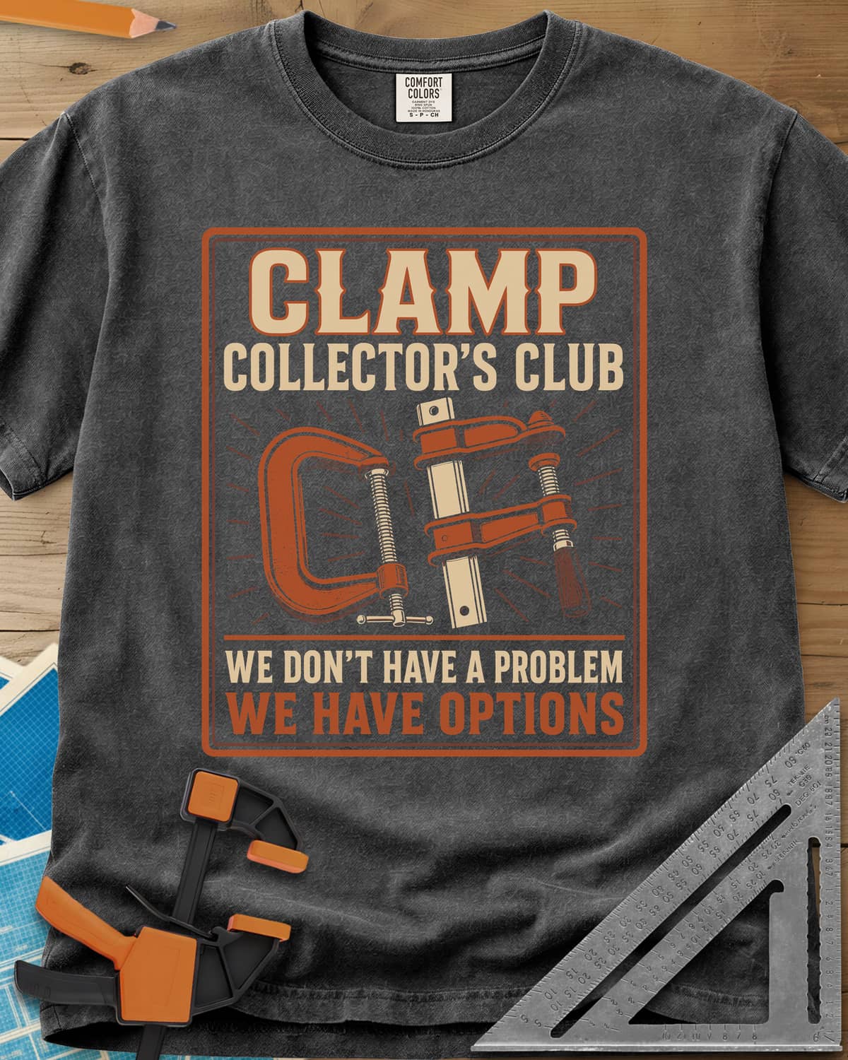 Clamp Collectors Options heavyweight tee in Pepper, framed club badge with a rust C-clamp and a bar clamp