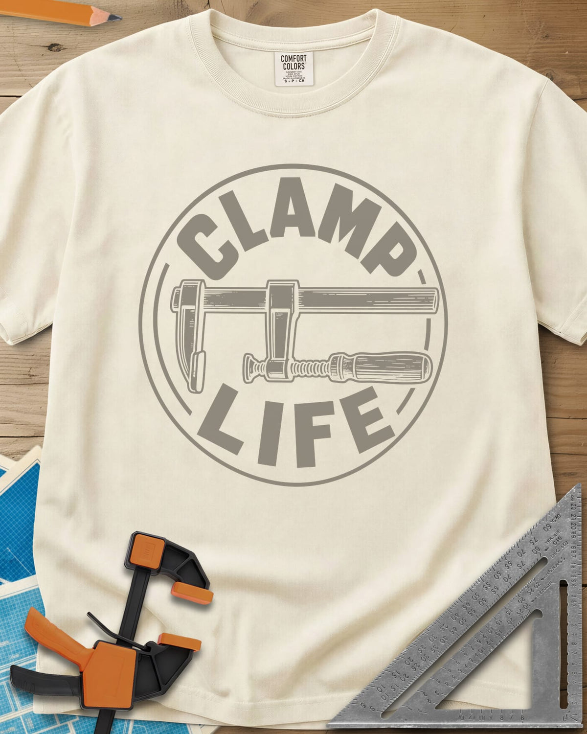 Clamp Life heavyweight tee in Ivory, a wood-handled bar clamp inside a round badge