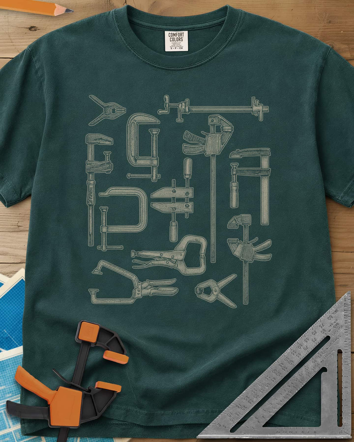 Clamps Collage heavyweight tee in Blue Spruce, a dozen engraved-style clamps of different types