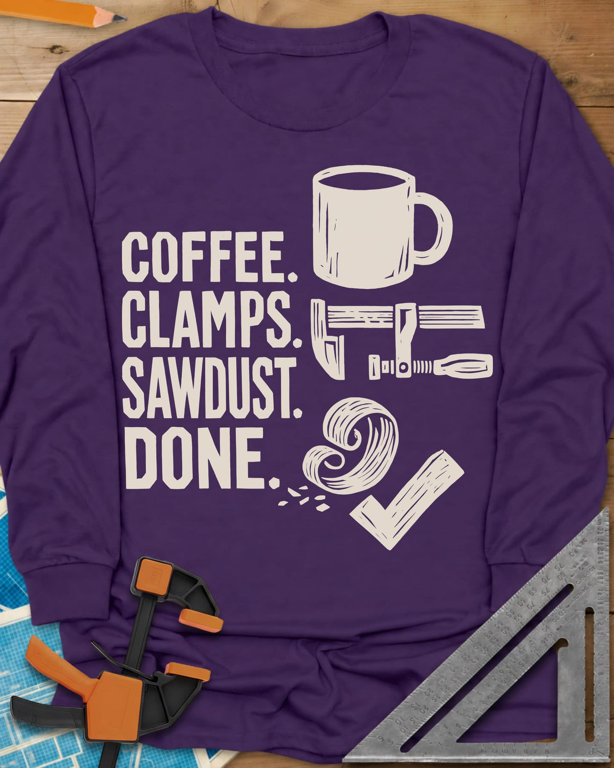 Coffee Clamps long sleeve shirt in Purple, a mug, a bar clamp, a wood shaving curl and a check mark