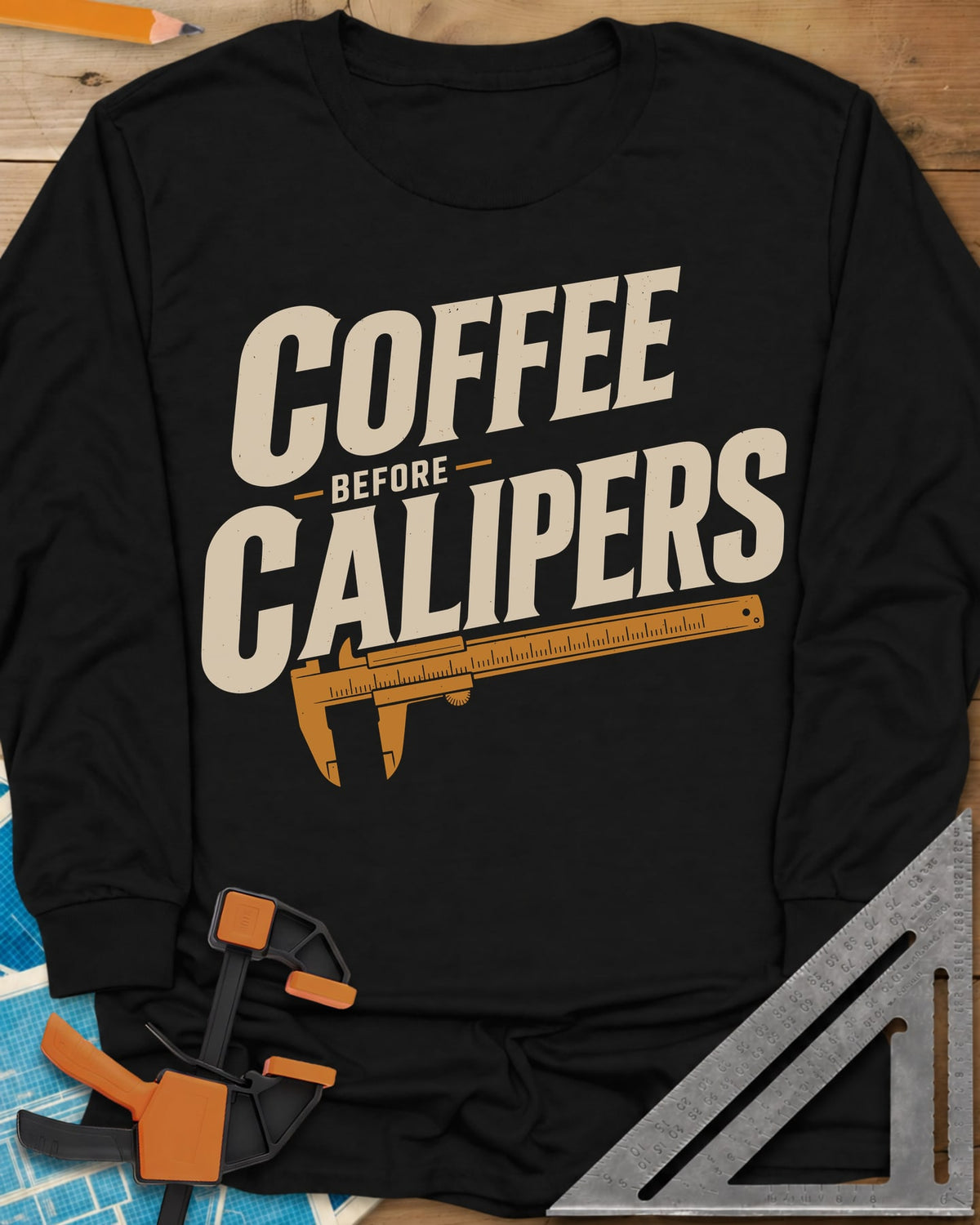 Coffee First long sleeve shirt in Black, bold slanted lettering with an orange vernier caliper below