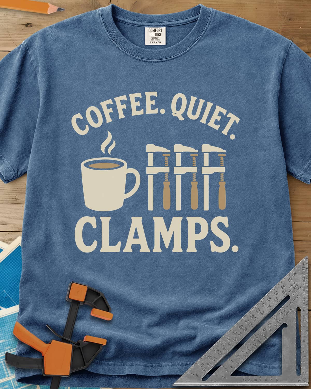 Coffee Quiet Clamps heavyweight tee in Blue Jean, a steaming mug beside three matching bar clamps