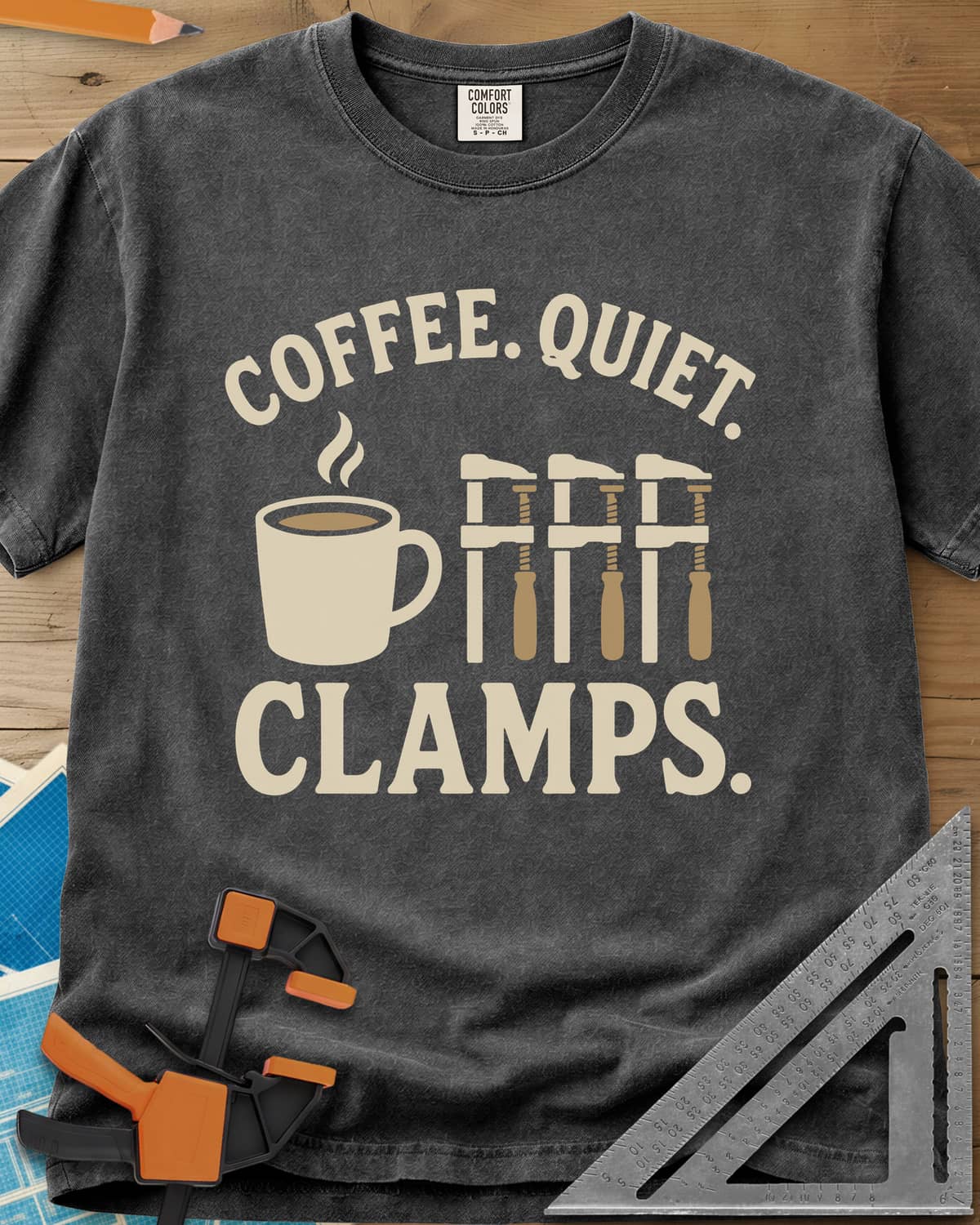 Coffee Quiet Clamps heavyweight tee in Pepper, a steaming mug beside three matching bar clamps