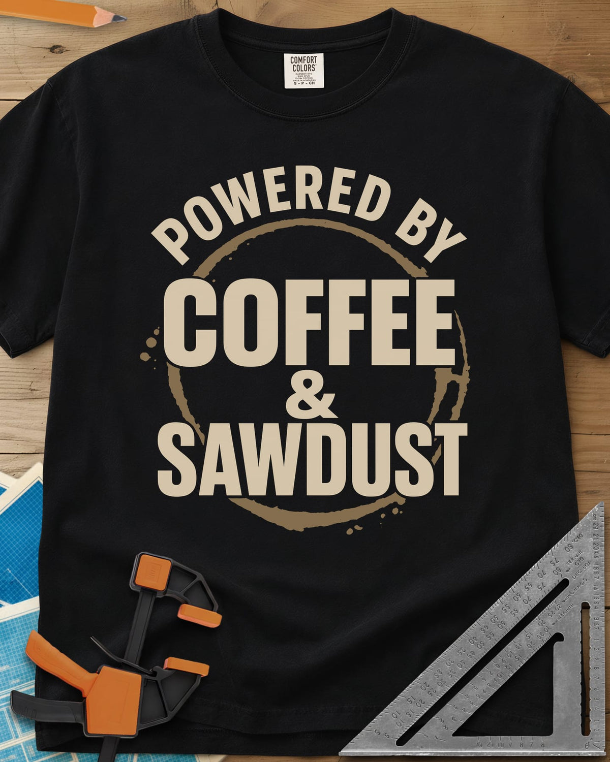 Coffee & Sawdust heavyweight tee in Black, stacked lettering inside a brown coffee-ring stain