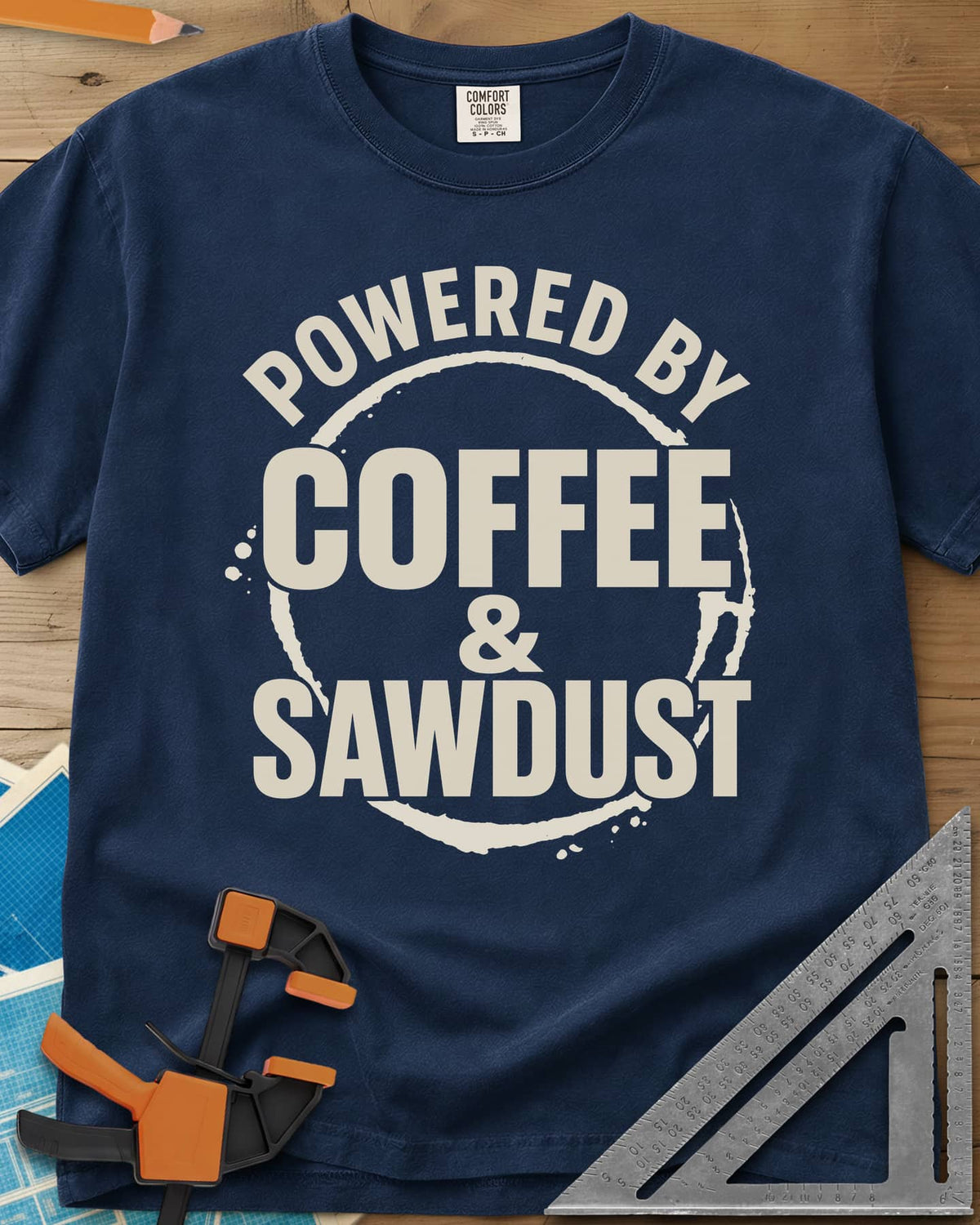 Coffee & Sawdust heavyweight tee in Navy, stacked lettering inside a brown coffee-ring stain