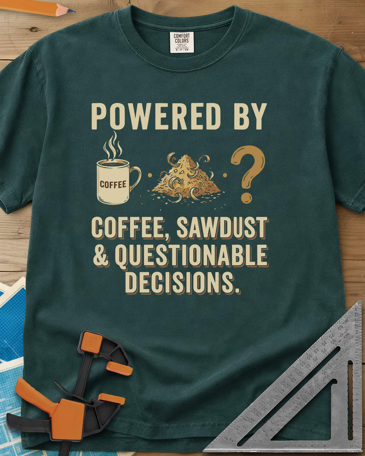 Coffee Sawdust & Questionable Decisions heavyweight tee in Blue Spruce, a coffee mug, a sawdust pile and a question mark