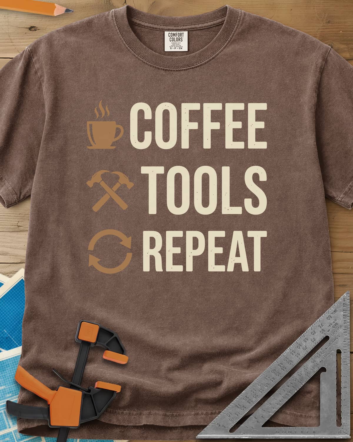 Coffee Tools Repeat heavyweight tee in Espresso, a steaming cup, crossed hammers and loop arrows beside the words