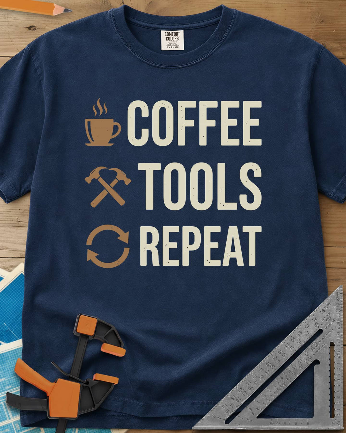 Coffee Tools Repeat heavyweight tee in Navy, a steaming cup, crossed hammers and loop arrows beside the words
