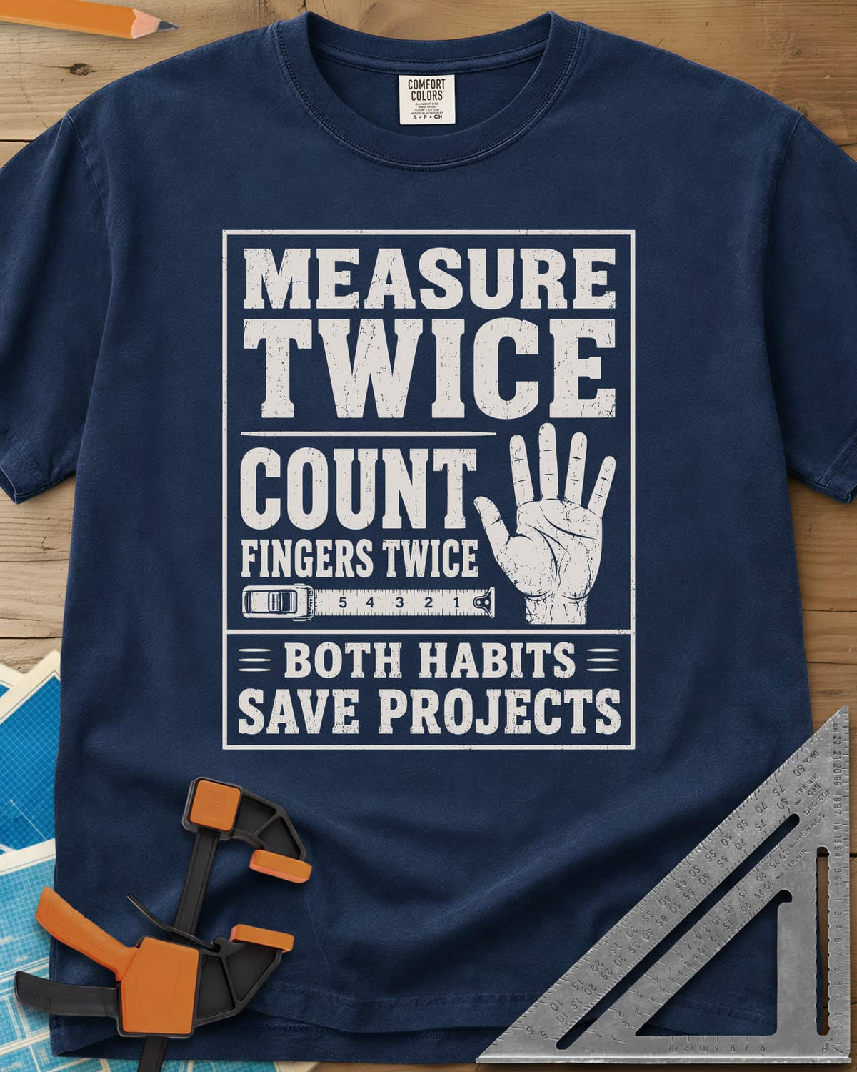 Count Fingers Twice heavyweight tee in Navy, a framed poster print with a raised open hand and a tape measure