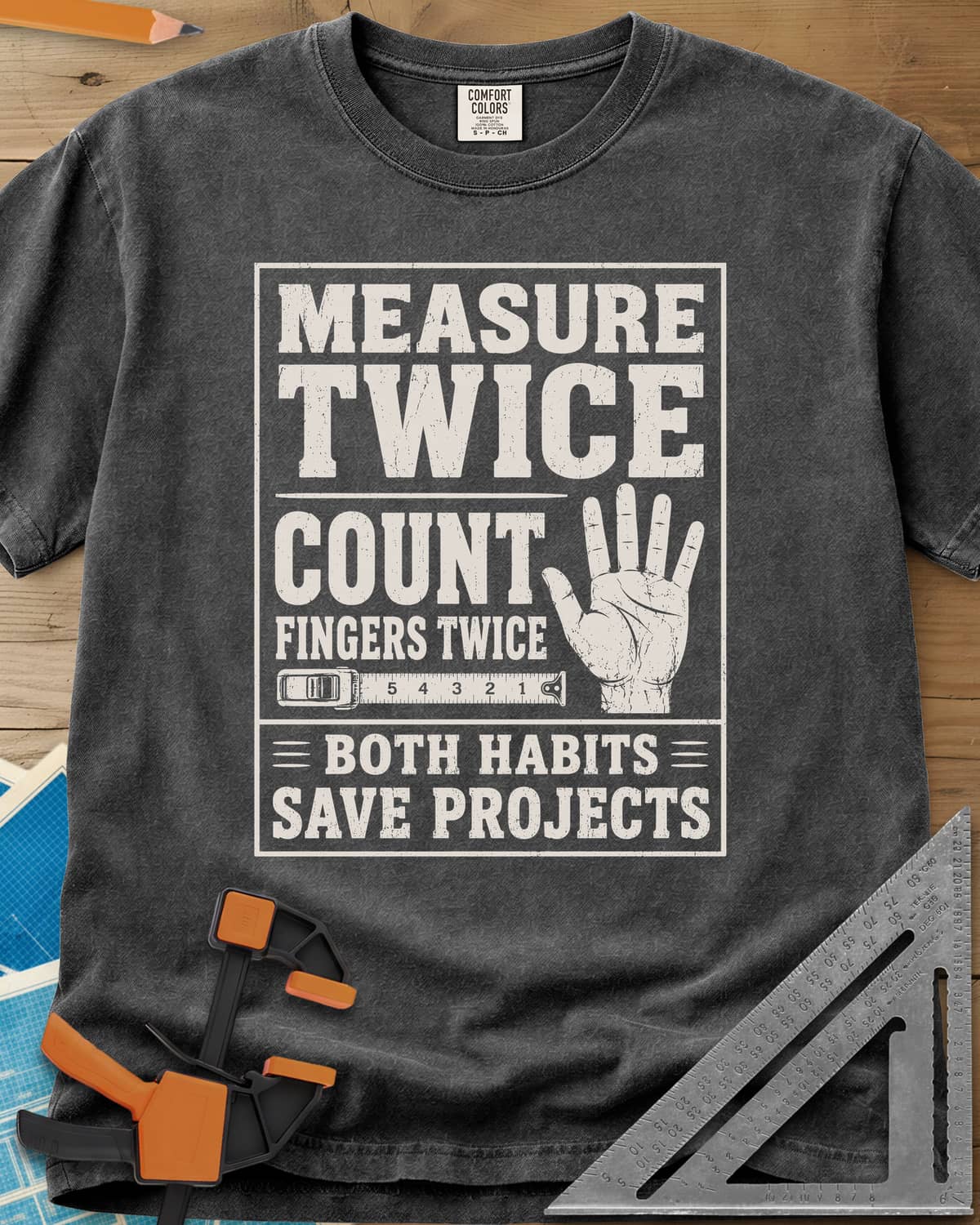 Count Fingers Twice heavyweight tee in Pepper, a framed poster print with a raised open hand and a tape measure
