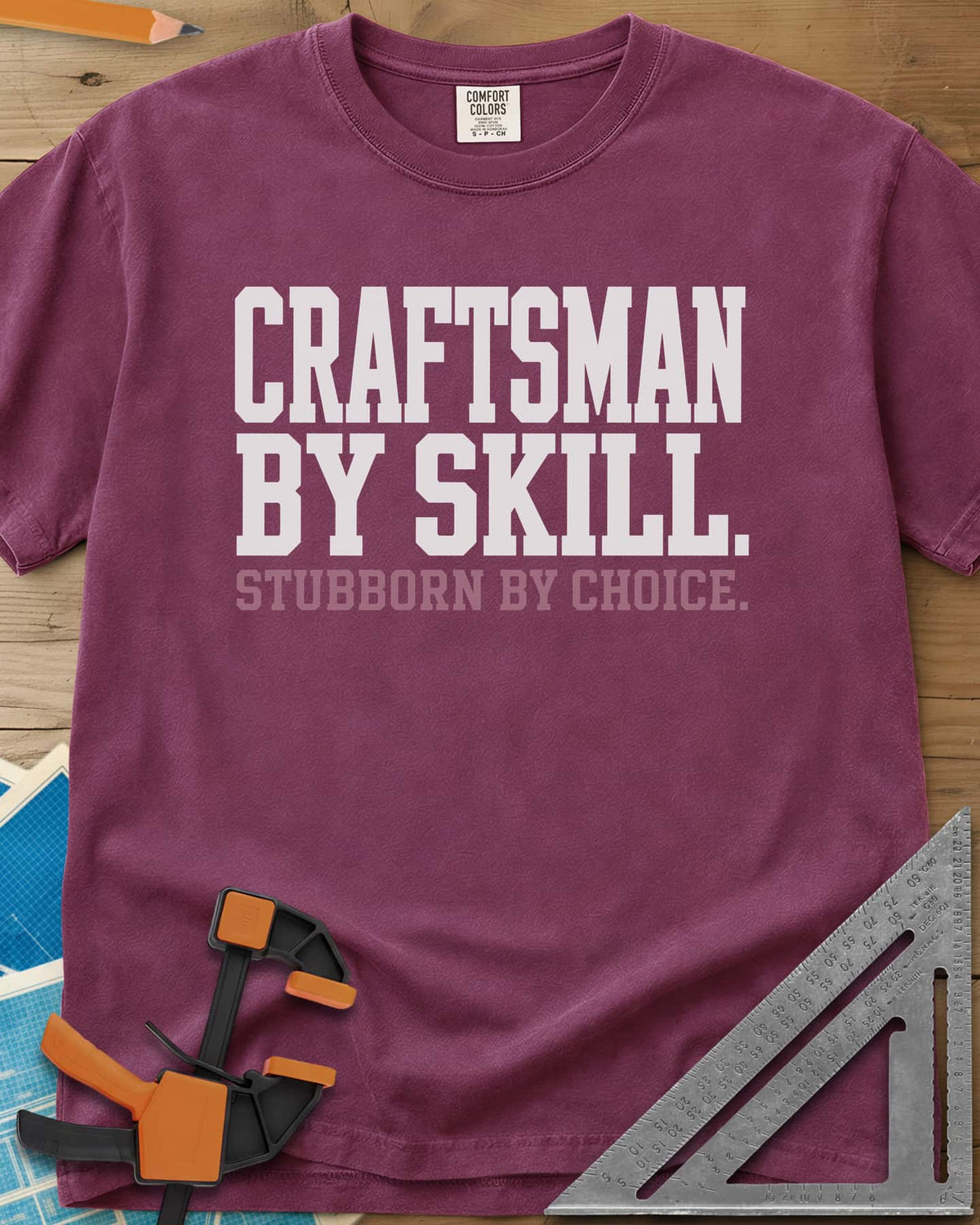 Craftsman Skill heavyweight tee in Berry, two lines of bold block lettering, nothing else