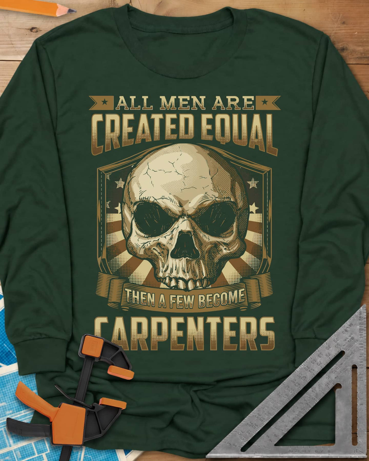 Created Equal Carpenter long sleeve shirt in Forest Green, a cracked skull on a shield with stars and sunburst rays