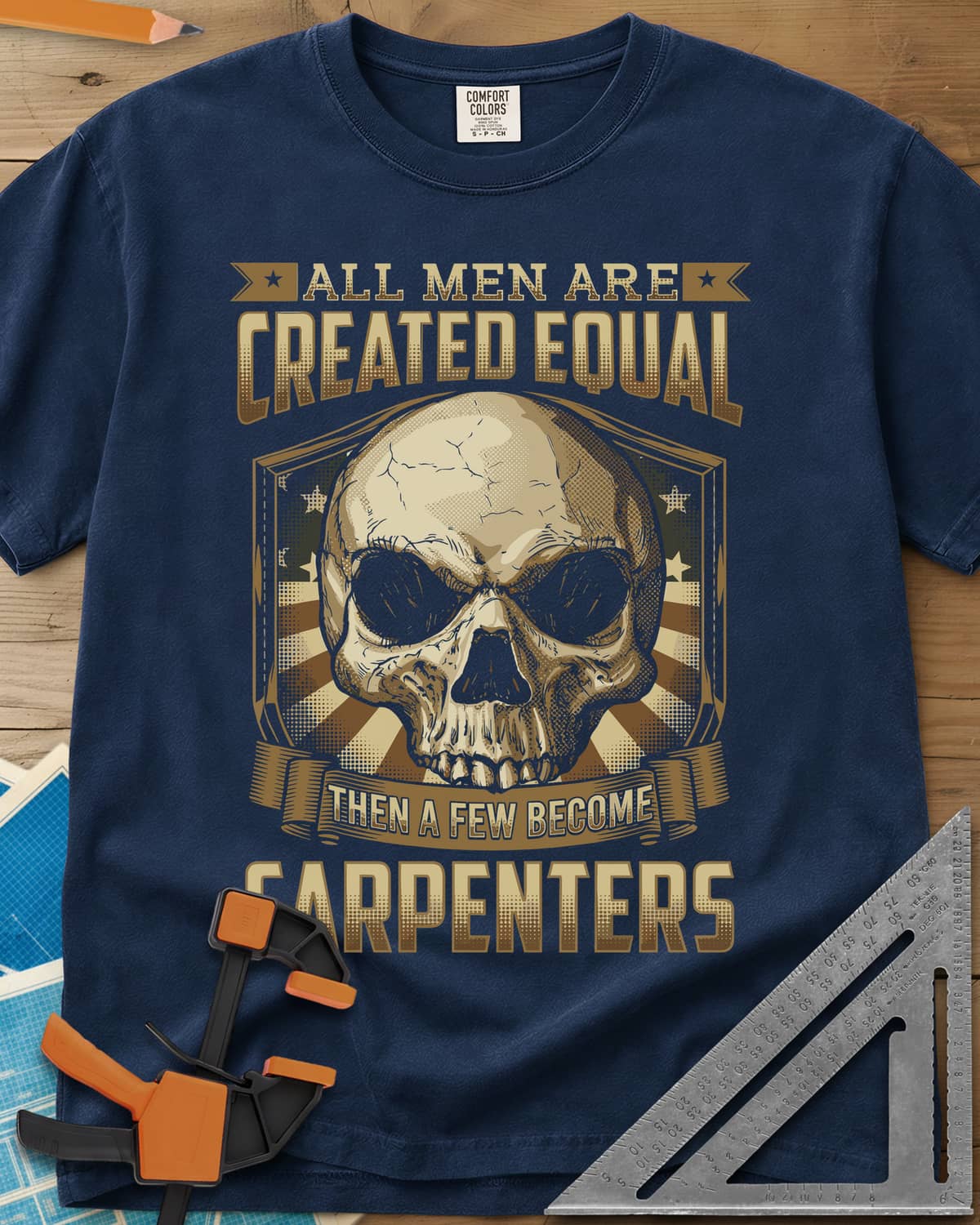 Created Equal Carpenter heavyweight tee in Navy, a cracked skull on a shield with stars and sunburst rays