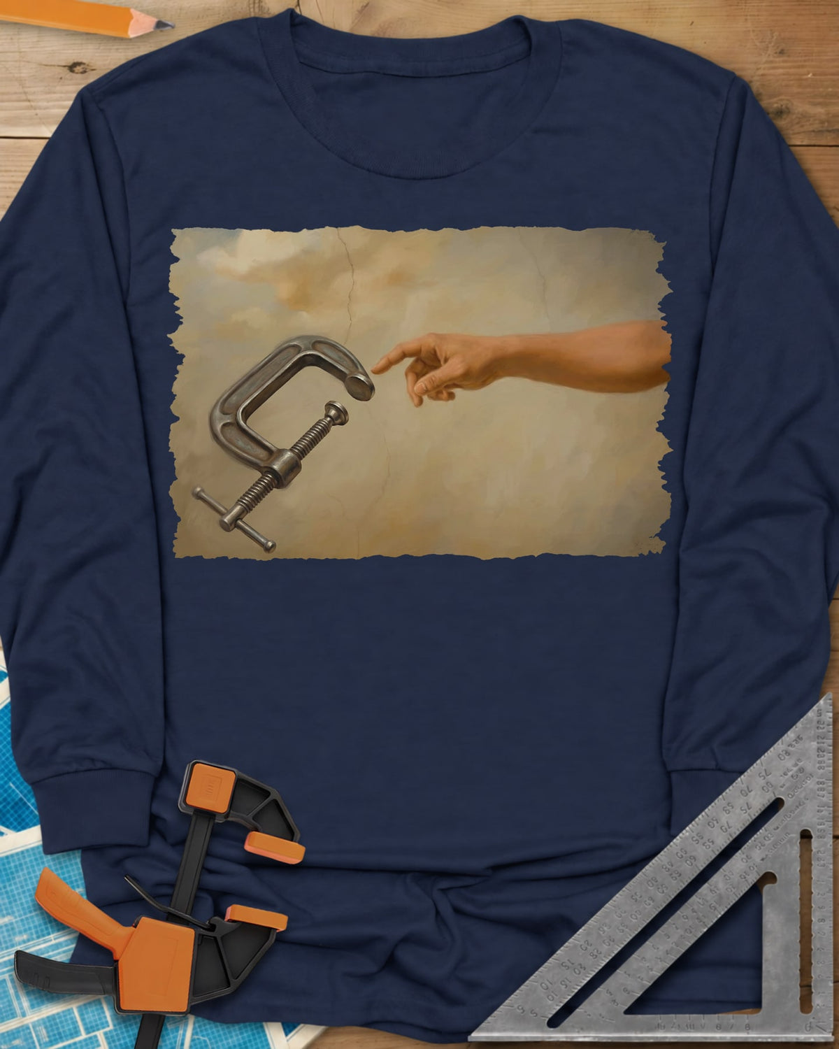 Creation Of The Clamp Woodworking long sleeve shirt in Navy, a hand reaching for a C-clamp in an aged fresco style