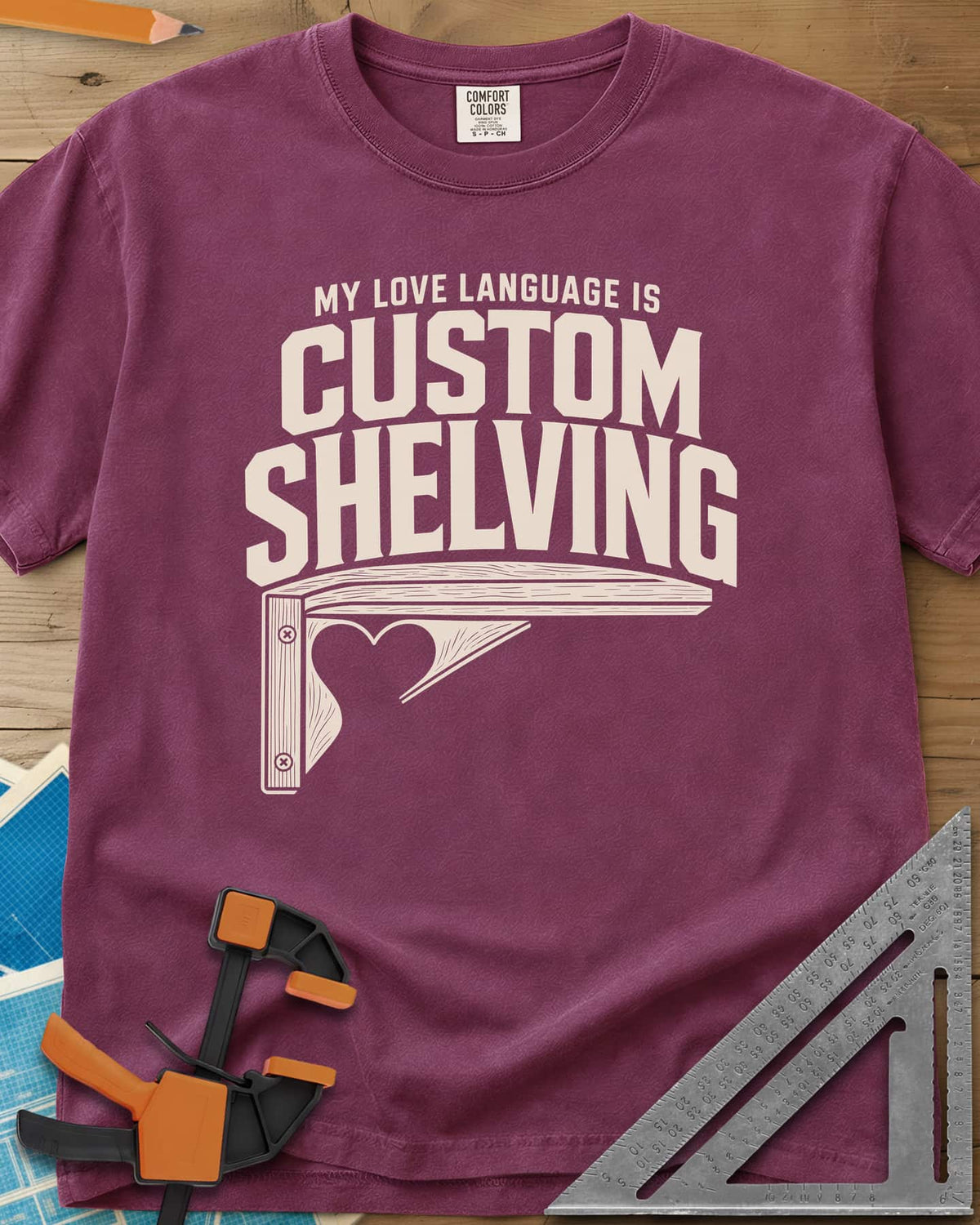 Custom Shelving heavyweight tee in Berry, an angled shelf bracket with a heart-shaped cutout