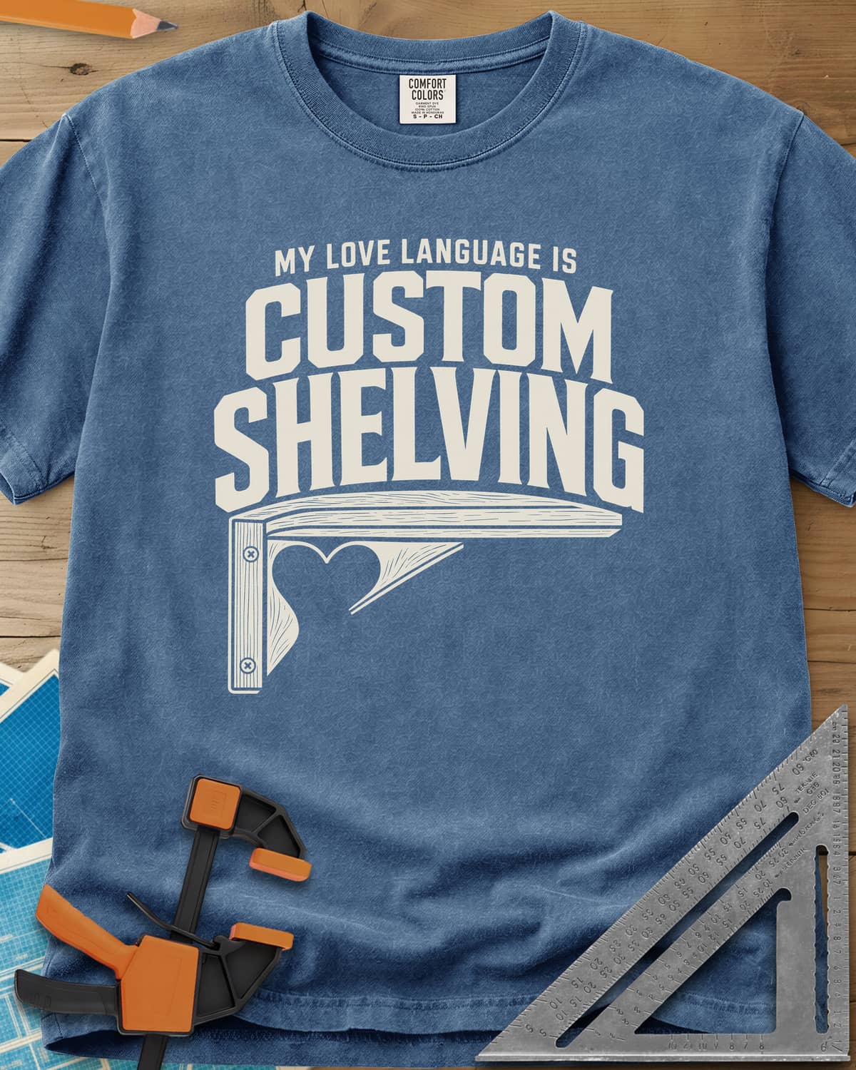 Custom Shelving heavyweight tee in Blue Jean, an angled shelf bracket with a heart-shaped cutout