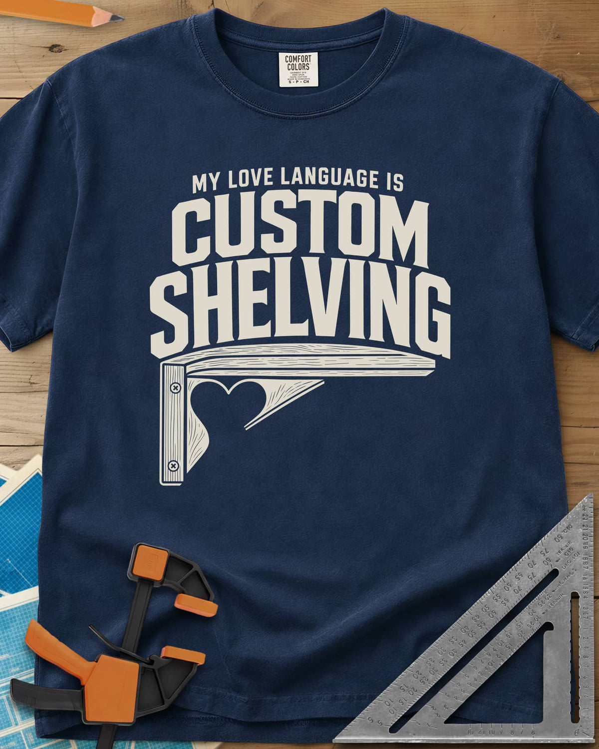 Custom Shelving heavyweight tee in Navy, an angled shelf bracket with a heart-shaped cutout