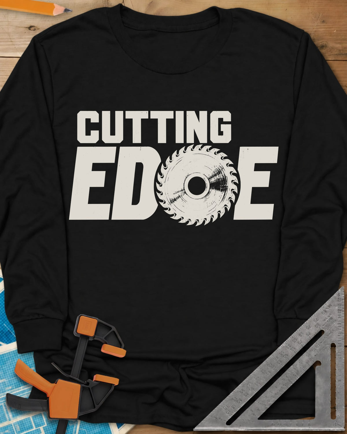 Cutting Edge long sleeve shirt in Black, bold lettering with a circular saw blade standing in for the G