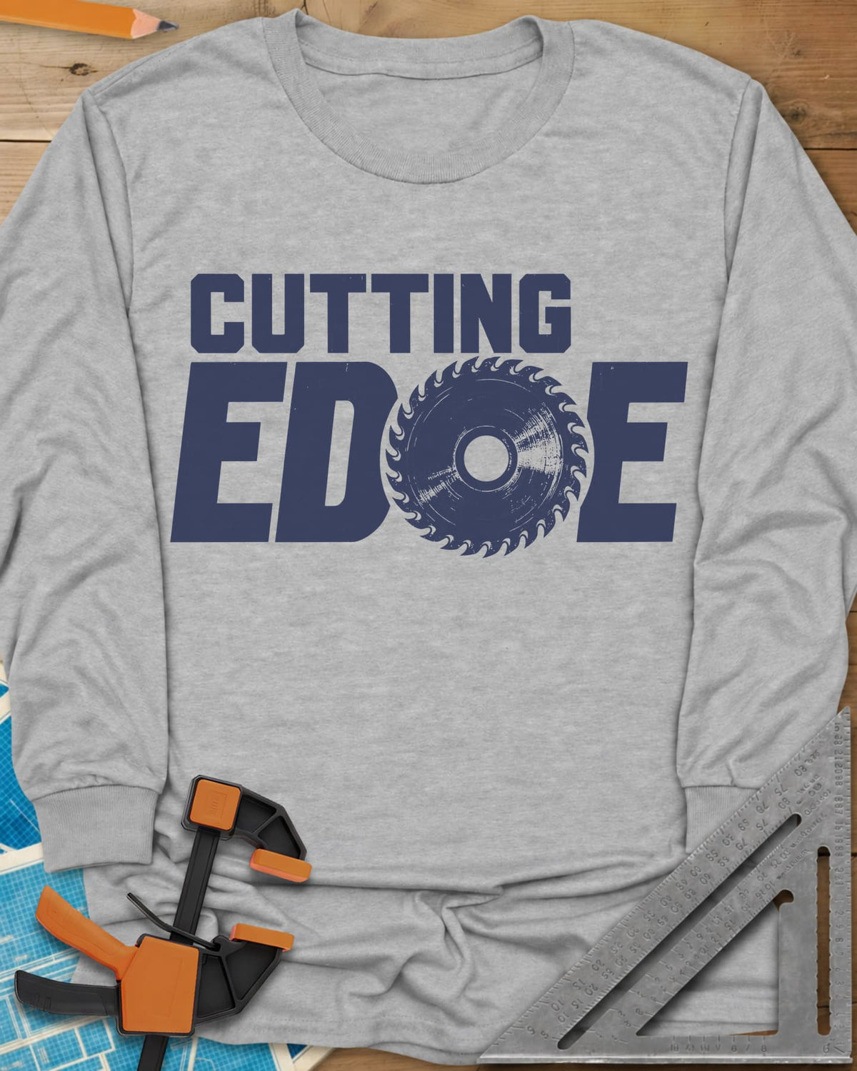 Cutting Edge long sleeve shirt in Sport Grey, bold lettering with a circular saw blade standing in for the G