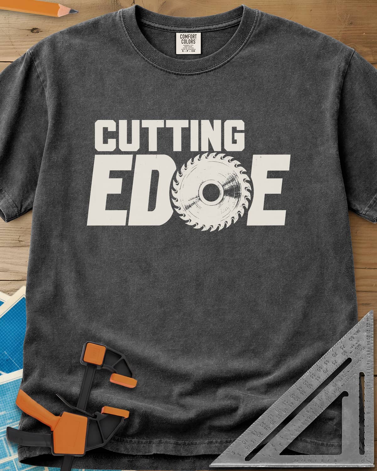 Cutting Edge heavyweight tee in Pepper, bold lettering with a circular saw blade standing in for the G