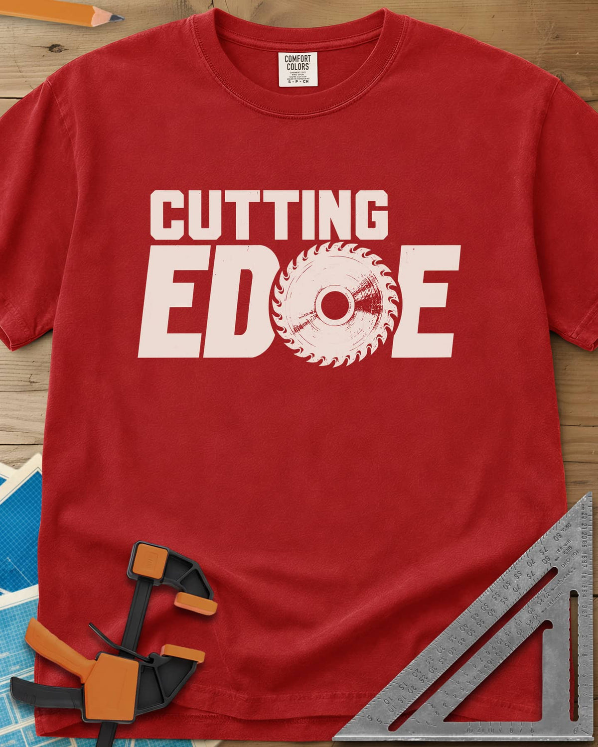 Cutting Edge heavyweight tee in Red, bold lettering with a circular saw blade standing in for the G