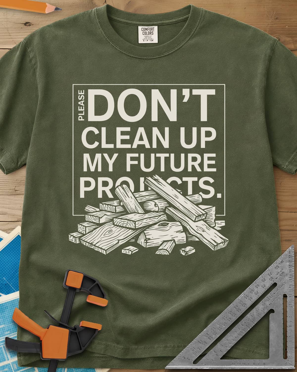 Don't Clean Up My Future Projects heavyweight tee in Hemp, a boxed plea with a pile of boards and offcuts below