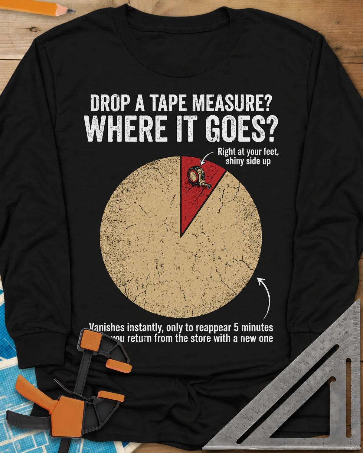 Drop a Tape Measure long sleeve shirt in Black, a cracked pie chart with a tiny red slice holding a tape measure