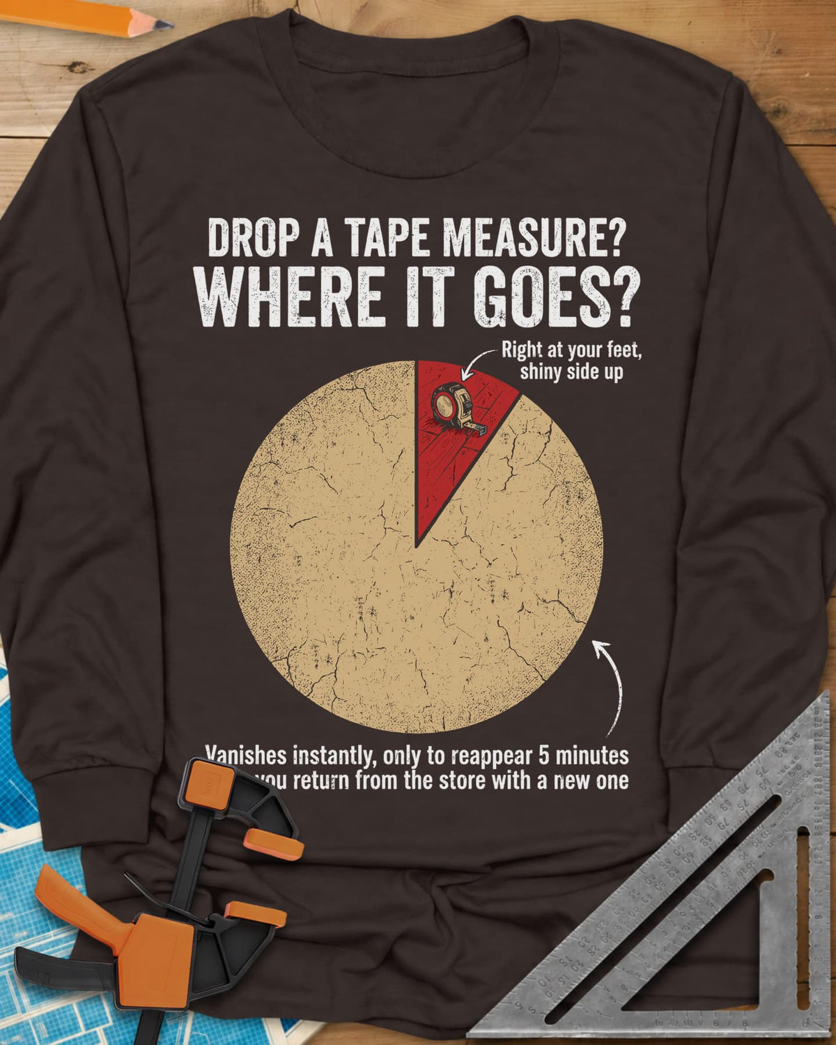 Drop a Tape Measure long sleeve shirt in Dark Chocolate, a cracked pie chart with a tiny red slice holding a tape measure