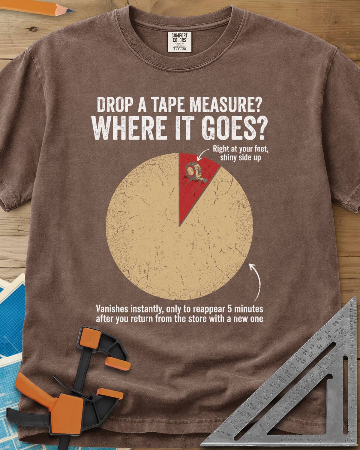 Drop a Tape Measure heavyweight tee in Espresso, a cracked pie chart with a tiny red slice holding a tape measure