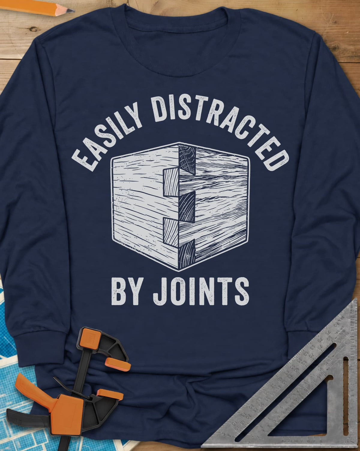 Easily Distracted by Joints long sleeve shirt in Navy, a woodcut-style dovetail joint at a box corner
