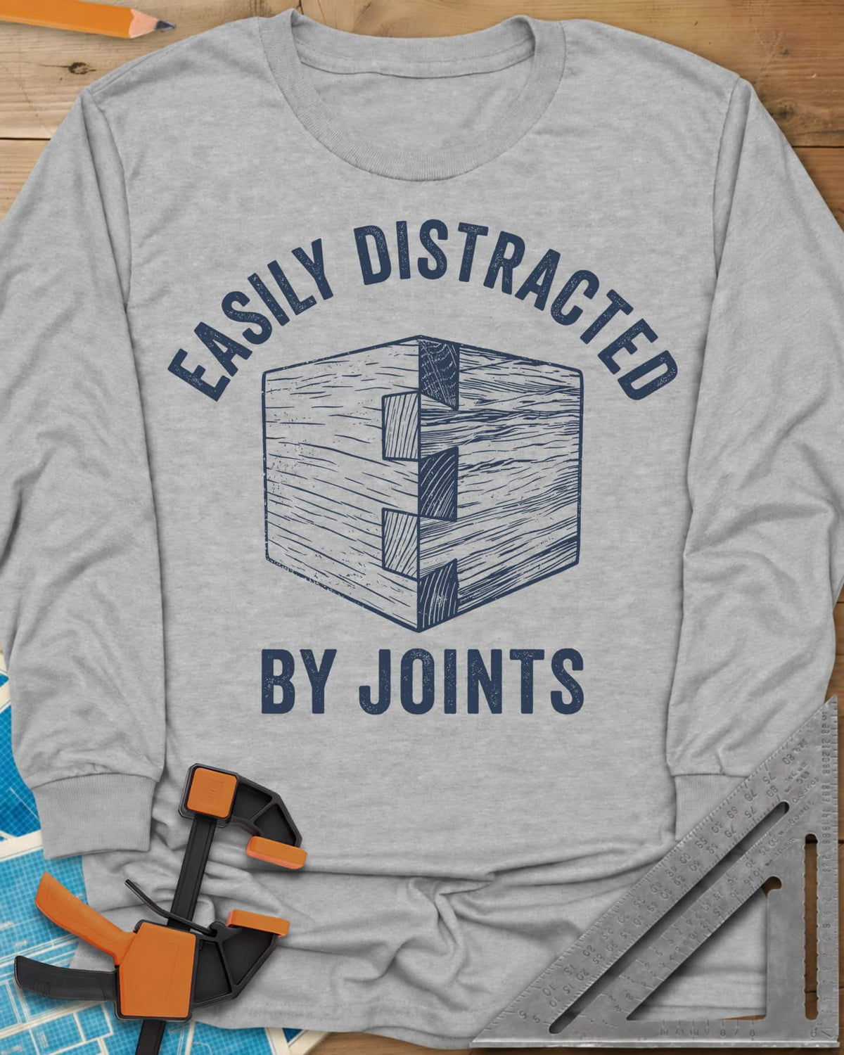 Easily Distracted by Joints long sleeve shirt in Sport Grey, a woodcut-style dovetail joint at a box corner