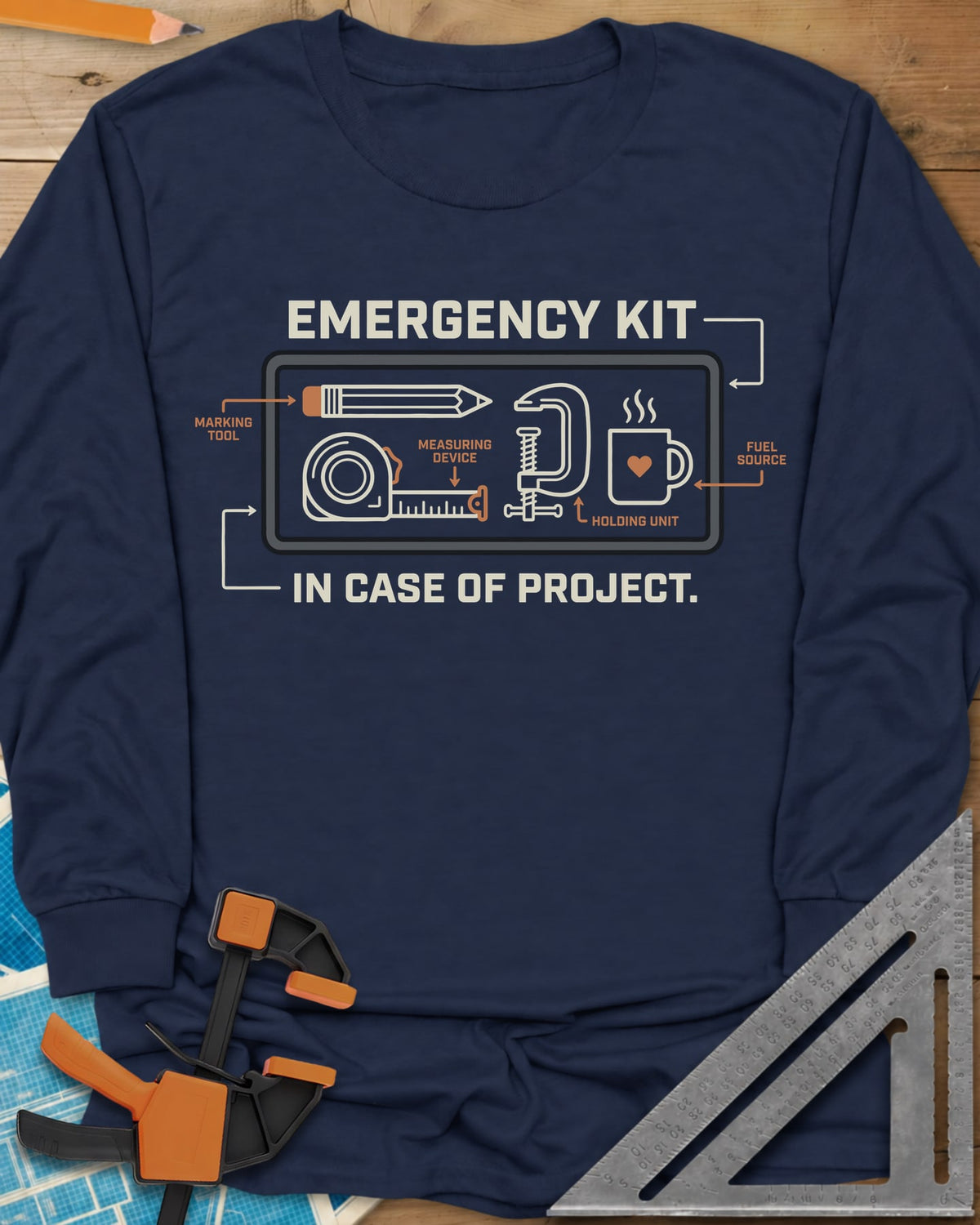 Emergency Kit Project long sleeve shirt in Navy, a labeled kit diagram: pencil, tape, clamp and heart mug