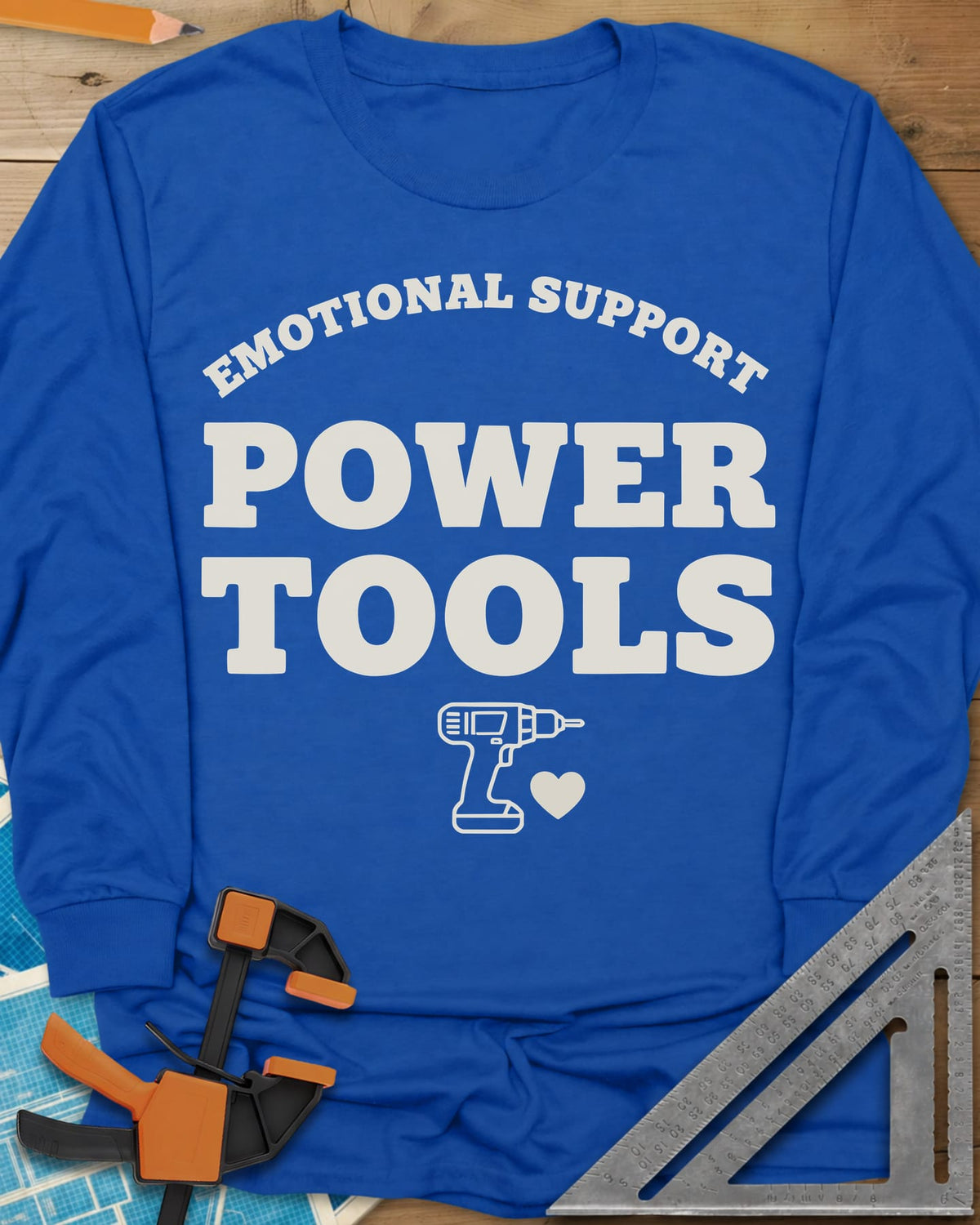 Emotional Support Power Tools long sleeve shirt in Royal, a cordless drill with a small heart under the lettering