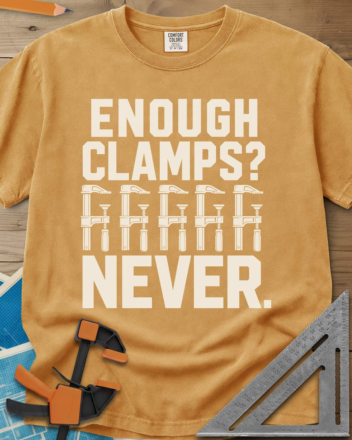 Enough Clamps heavyweight tee in Mustard, five bar clamps in a row between bold lettering