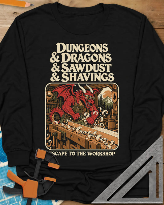 Escape To The Workshop long sleeve shirt in Black, a red dragon in goggles planing a board at a workbench