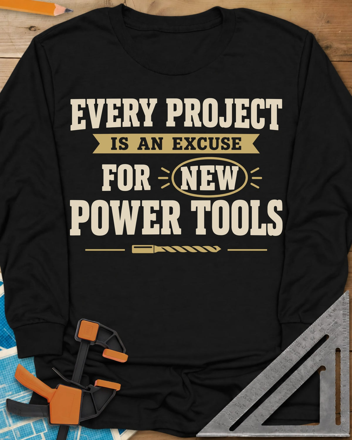 Every Project Is An Excuse long sleeve shirt in Black, slogan with a ribbon banner, circled NEW and a drill bit