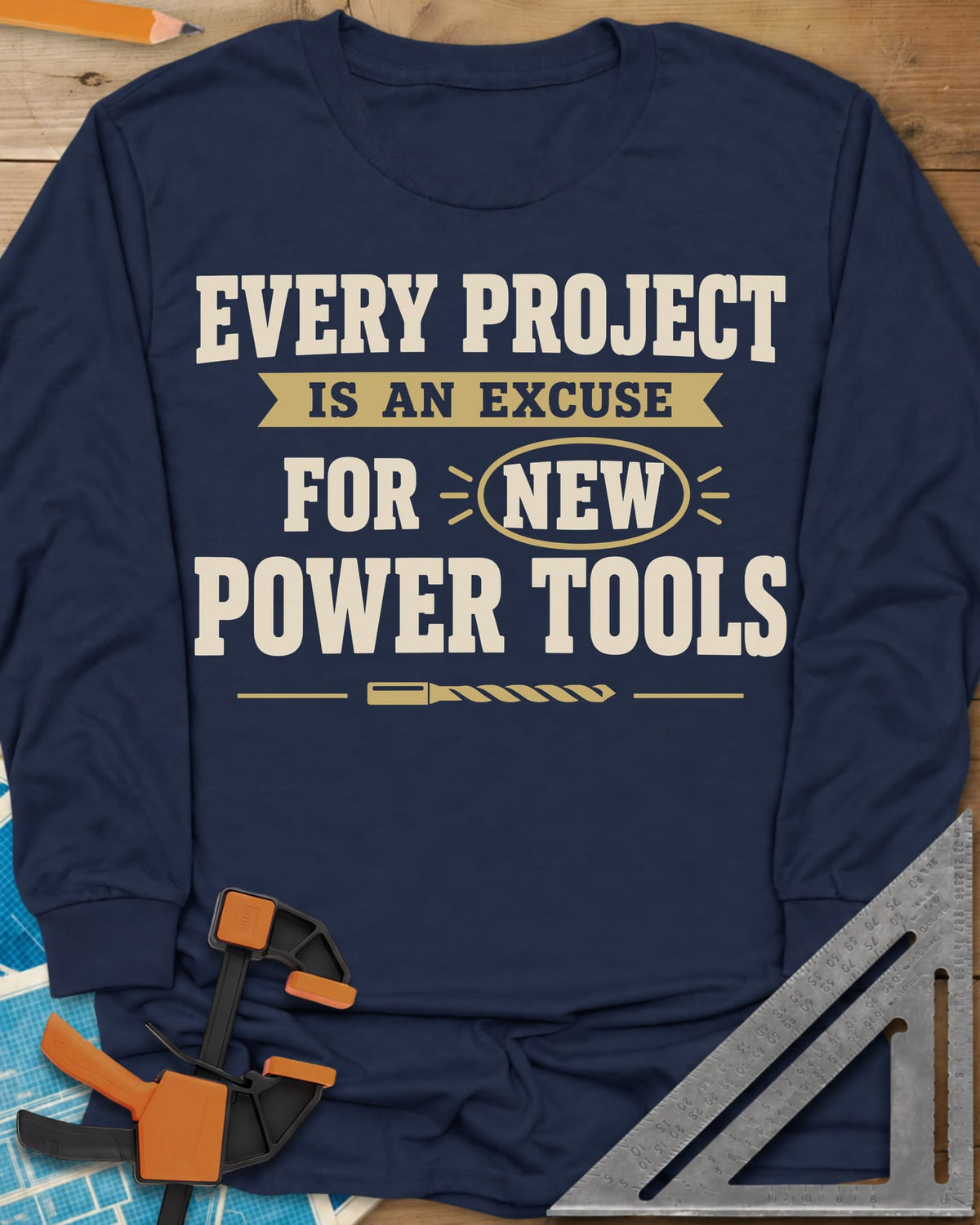 Every Project Is An Excuse long sleeve shirt in Navy, slogan with a ribbon banner, circled NEW and a drill bit