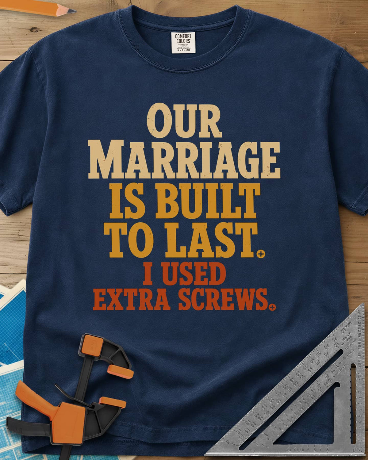 Extra Screws heavyweight tee in Navy, stacked lettering in cream, mustard and rust with tiny screw heads