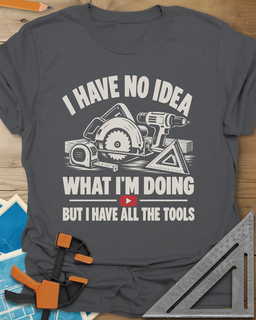 All The Tools t-shirt in Charcoal, circular saw, drill, tape measure and square above a play button