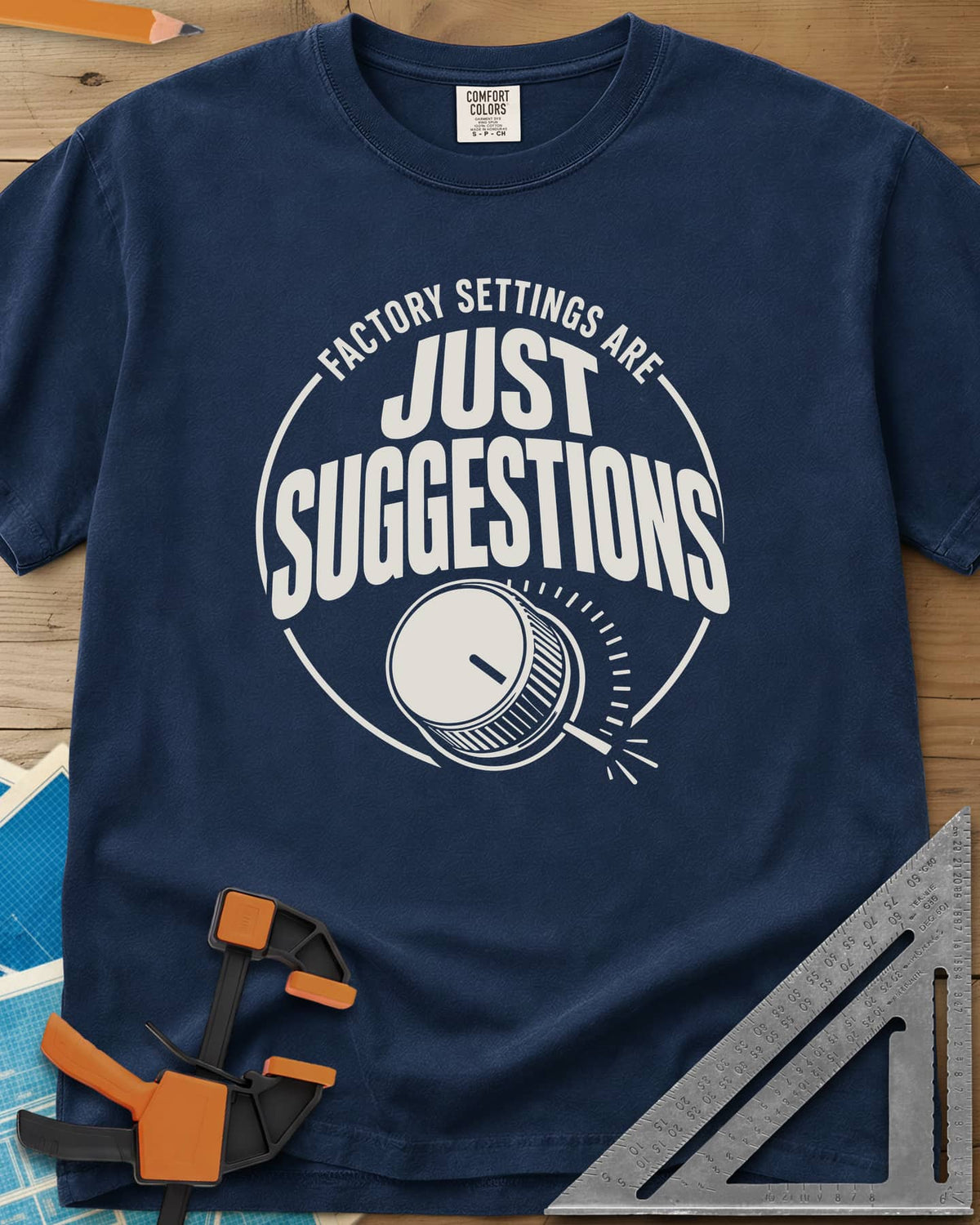 Factory Suggestions heavyweight tee in Navy, a round badge with a dial knob and tick marks
